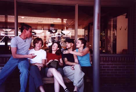 Sitting on a bench outside the Buff.